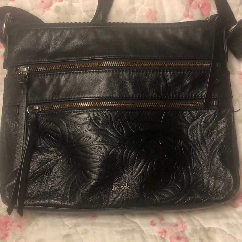 The Sak woman’s Reseda black crossbody bag